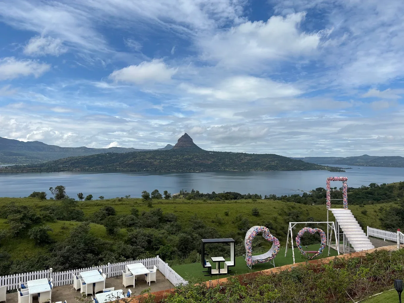 Sweeping panorama of Pawna Lake and surrounding mountains