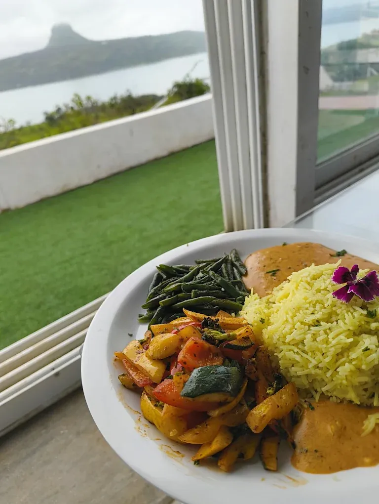 Wholesome rice meal served with a Pawna mountain backdrop